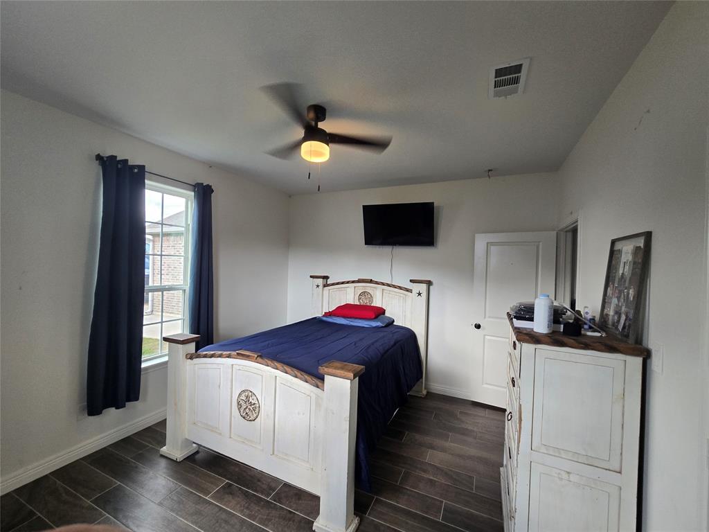 109 Baker Street Mount Vernon, TX 75457 - Photo 16 of 20 a view of a kitchen with a microwave and a window