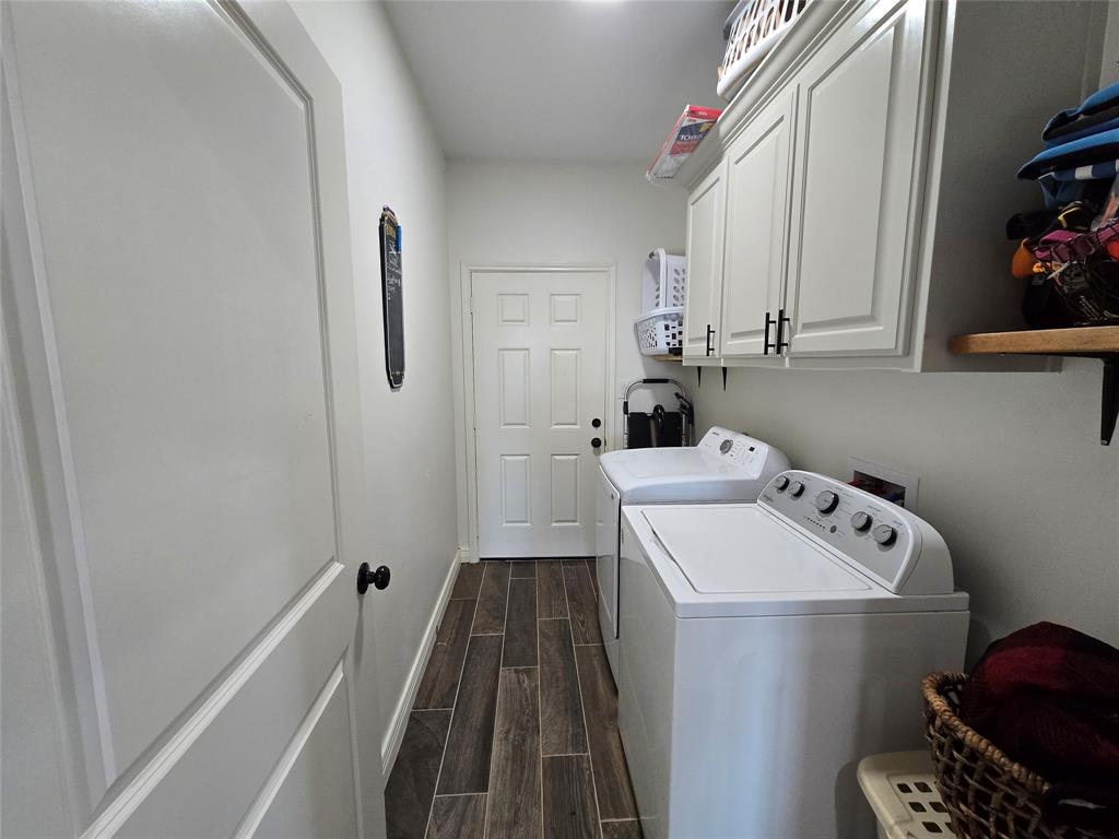 109 Baker Street Mount Vernon, TX 75457 - Photo 19 of 20 a bathroom with a sink and a mirror