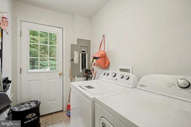 a bedroom with a bed and cabinets