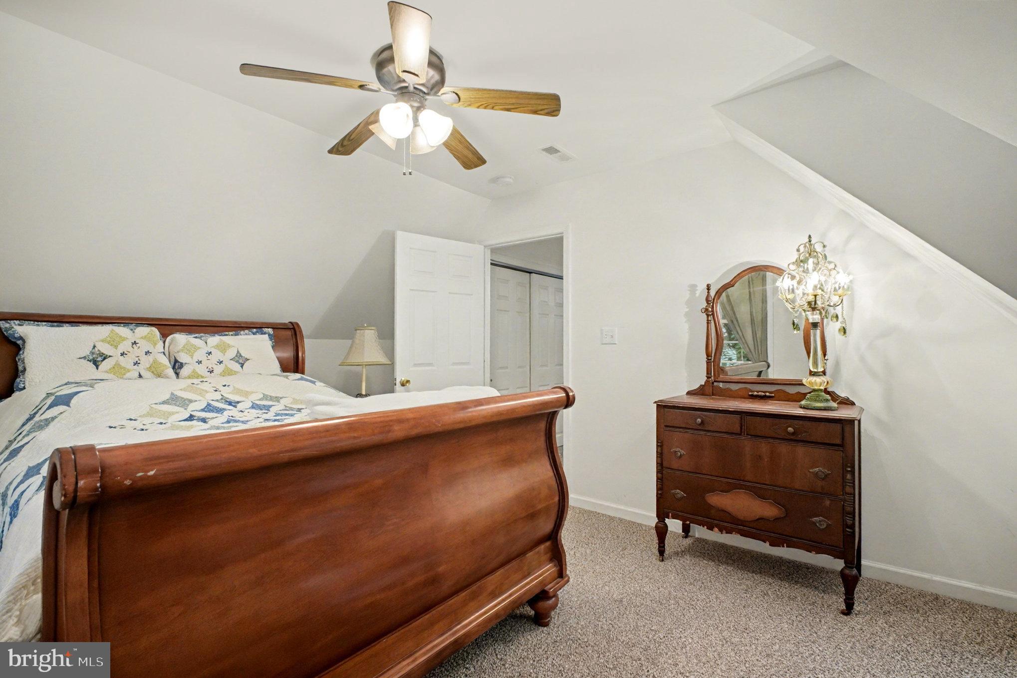 88 Carter Way Montross, VA 22520 - Photo 27 of 68 a bedroom with a bed and cabinets