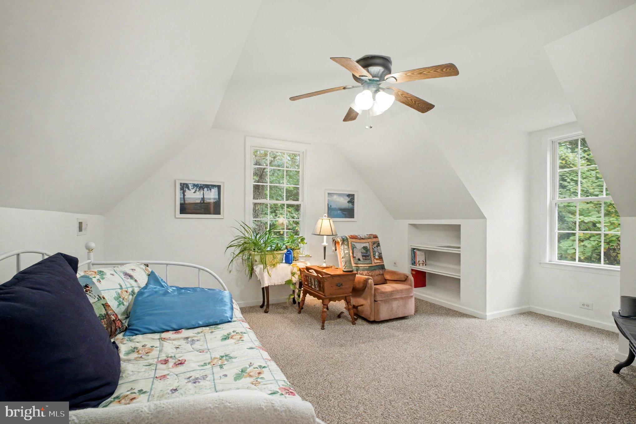 88 Carter Way Montross, VA 22520 - Photo 29 of 68 a living room with furniture ceiling fan and a window