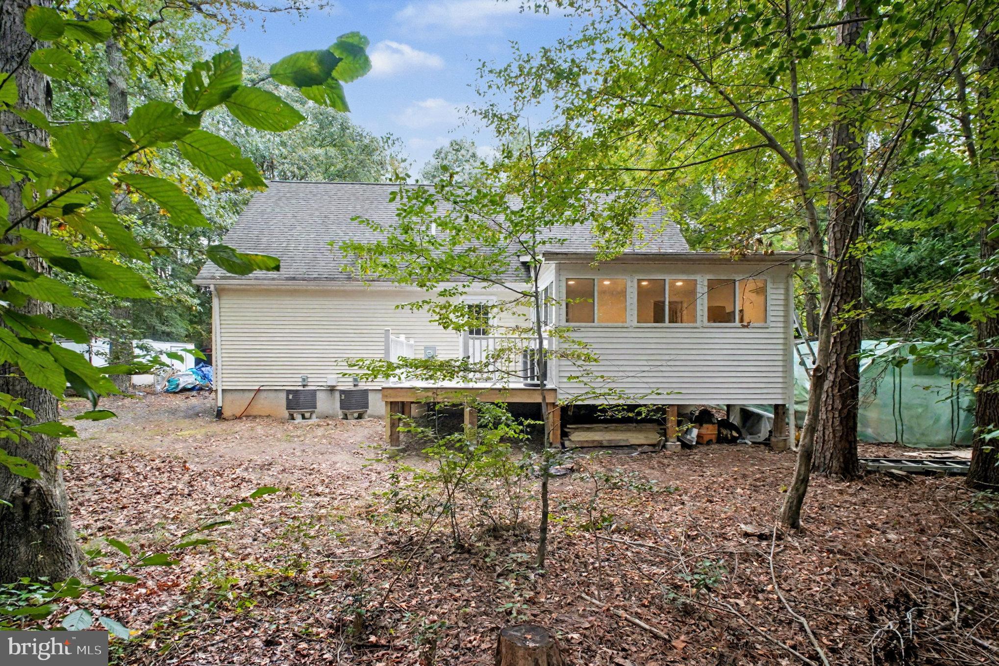 88 Carter Way Montross, VA 22520 - Photo 38 of 68 a view of a house with backyard and sitting area