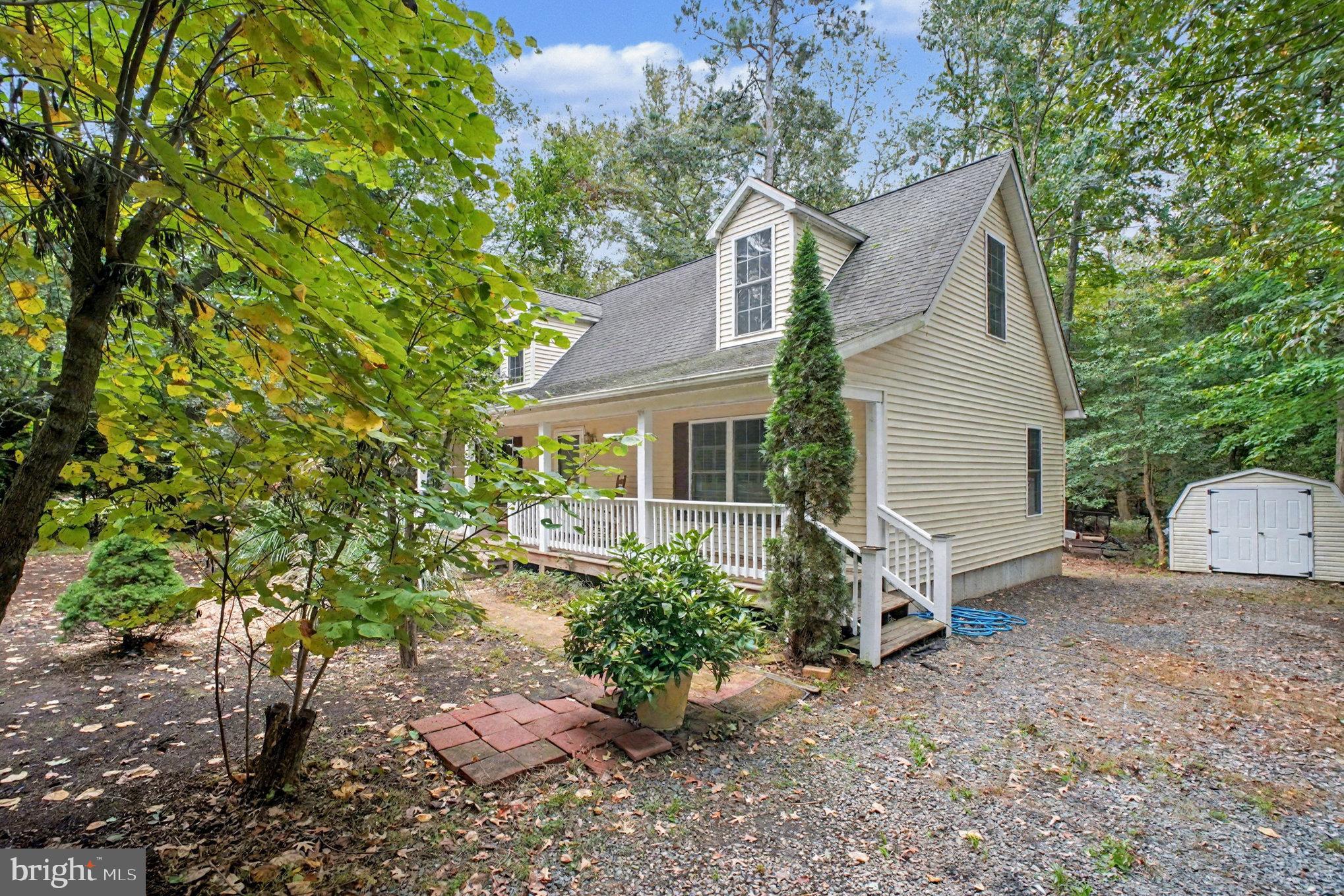 88 Carter Way Montross, VA 22520 - Photo 6 of 68 a view of a house with a yard and large tree