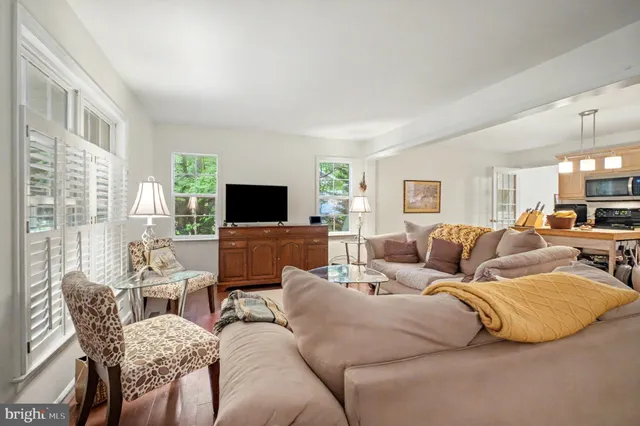 a living room with furniture and a couch