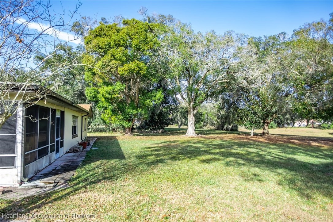 7801 Pine Glen Road Sebring, FL 33876 - Photo 34 of 50 BACK OF HOME AND BACK YARD