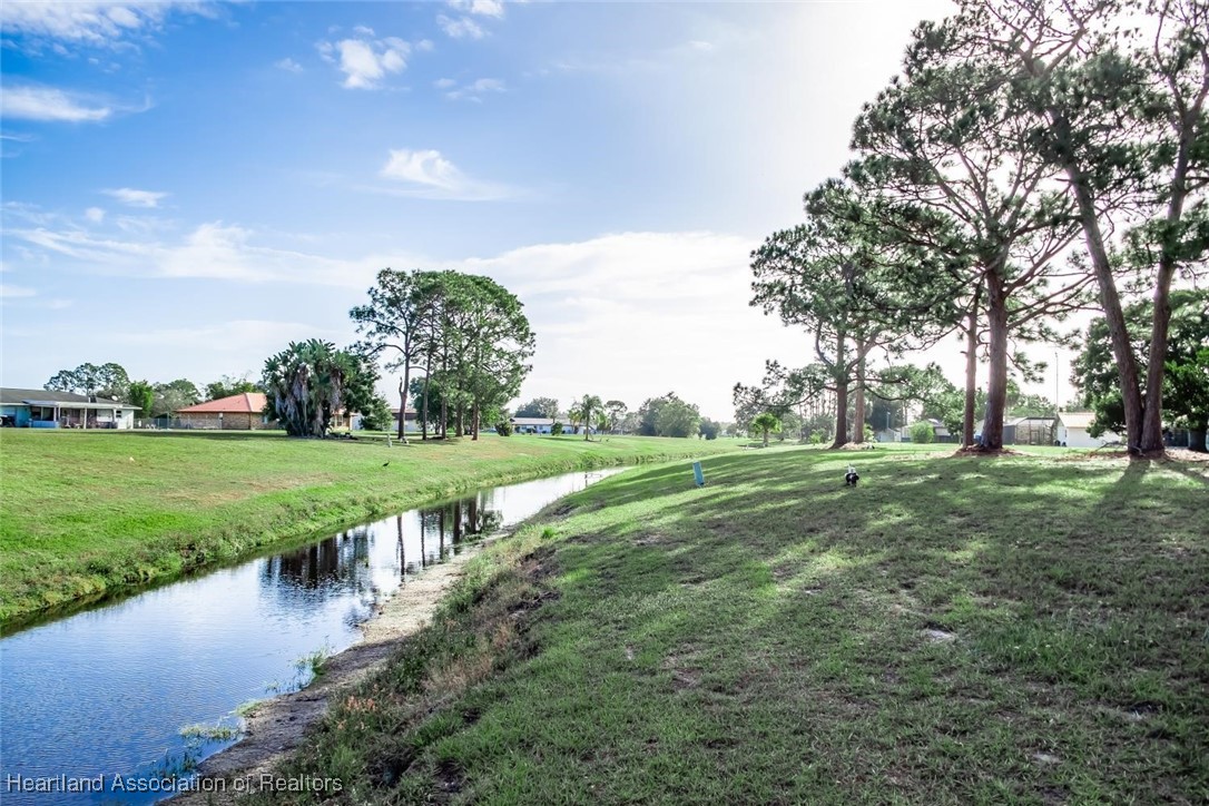 7801 Pine Glen Road Sebring, FL 33876 - Photo 37 of 50 CANAL BEHIND HOME