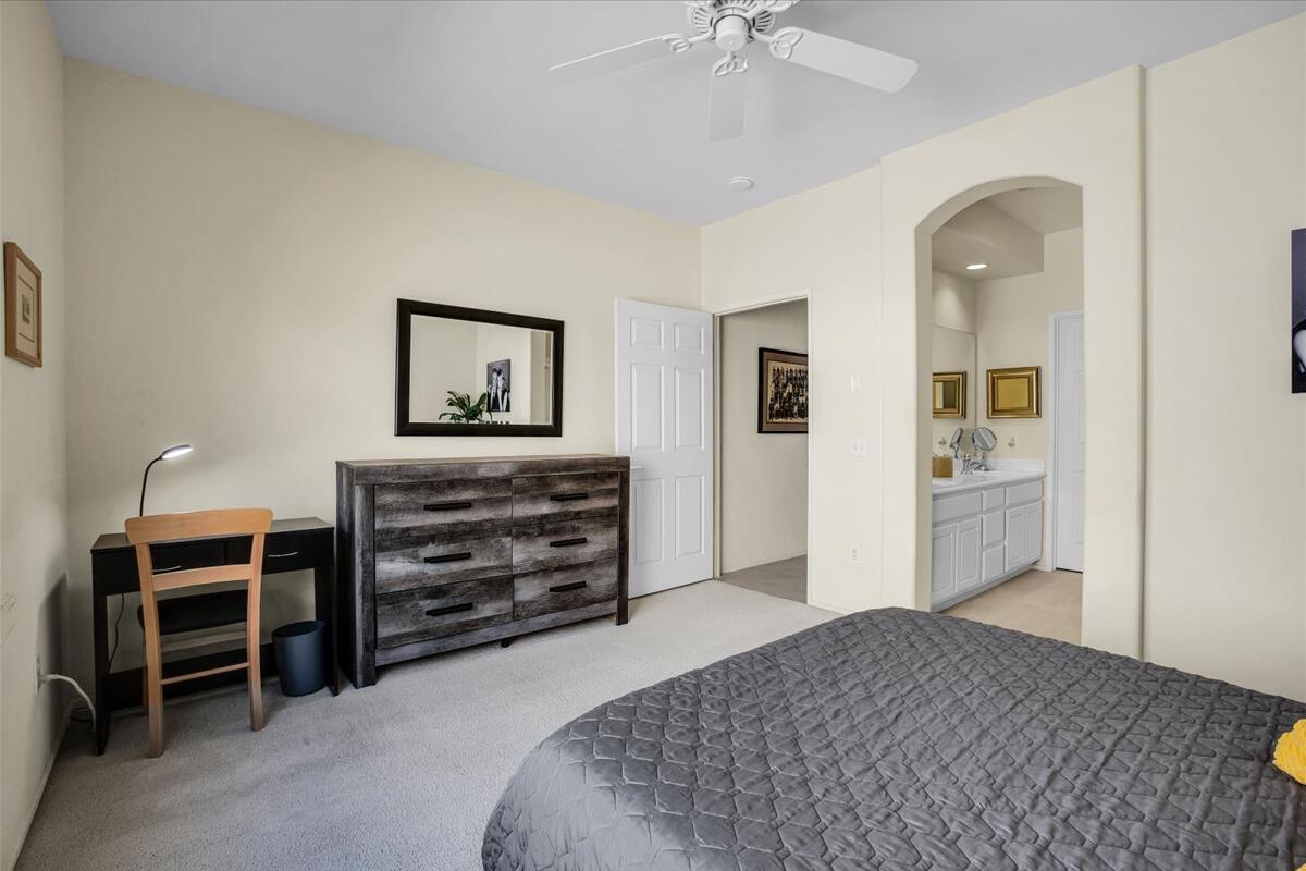 47795 Soft Moonlight La Quinta, CA 92253 - Photo 15 of 44 a bedroom with a bed and a dresser