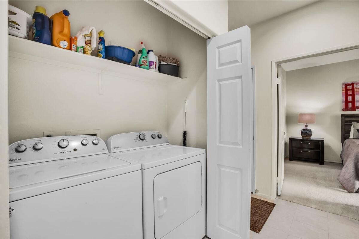 47795 Soft Moonlight La Quinta, CA 92253 - Photo 24 of 44 a utility room with dryer and washer