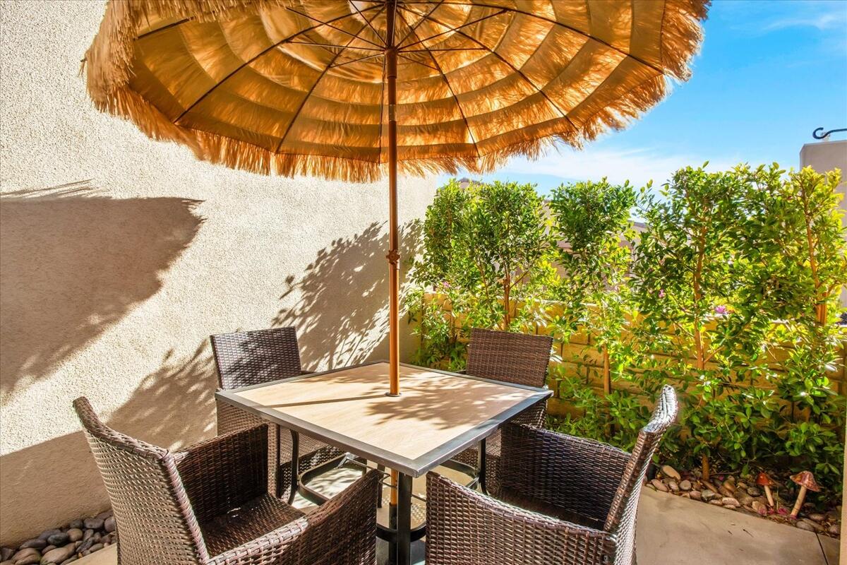 47795 Soft Moonlight La Quinta, CA 92253 - Photo 25 of 44 a view of a backyard with a table and chairs