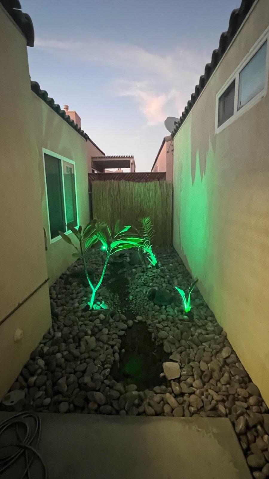 47795 Soft Moonlight La Quinta, CA 92253 - Photo 31 of 44 a backyard of a house with plants and outdoor seating