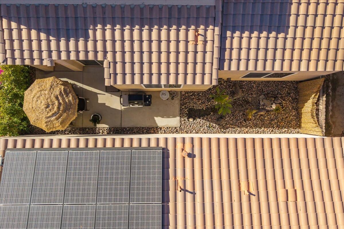 47795 Soft Moonlight La Quinta, CA 92253 - Photo 36 of 44 a view of a brick wall and window