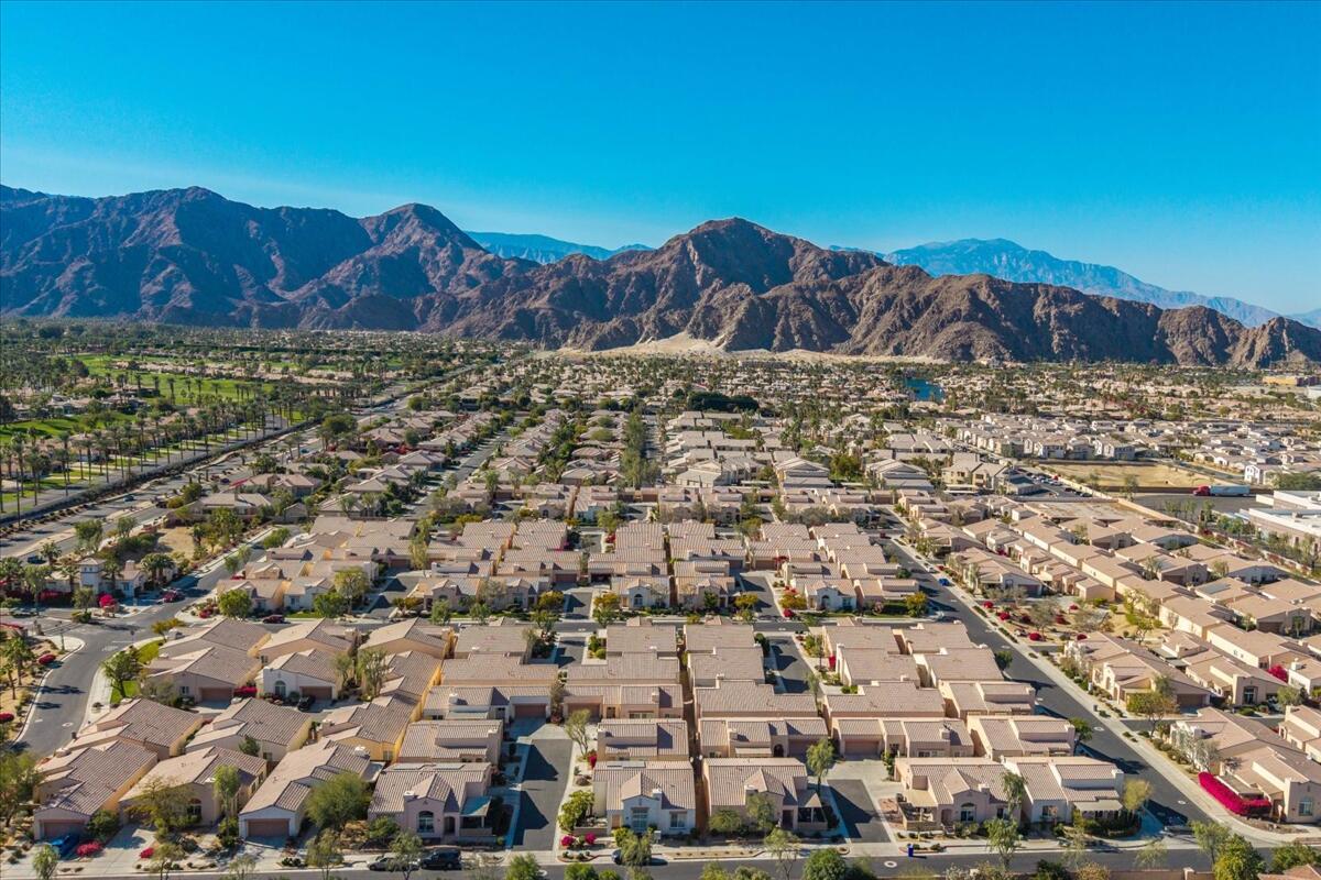 47795 Soft Moonlight La Quinta, CA 92253 - Photo 41 of 44 an aerial view of residential house and car parked in middle