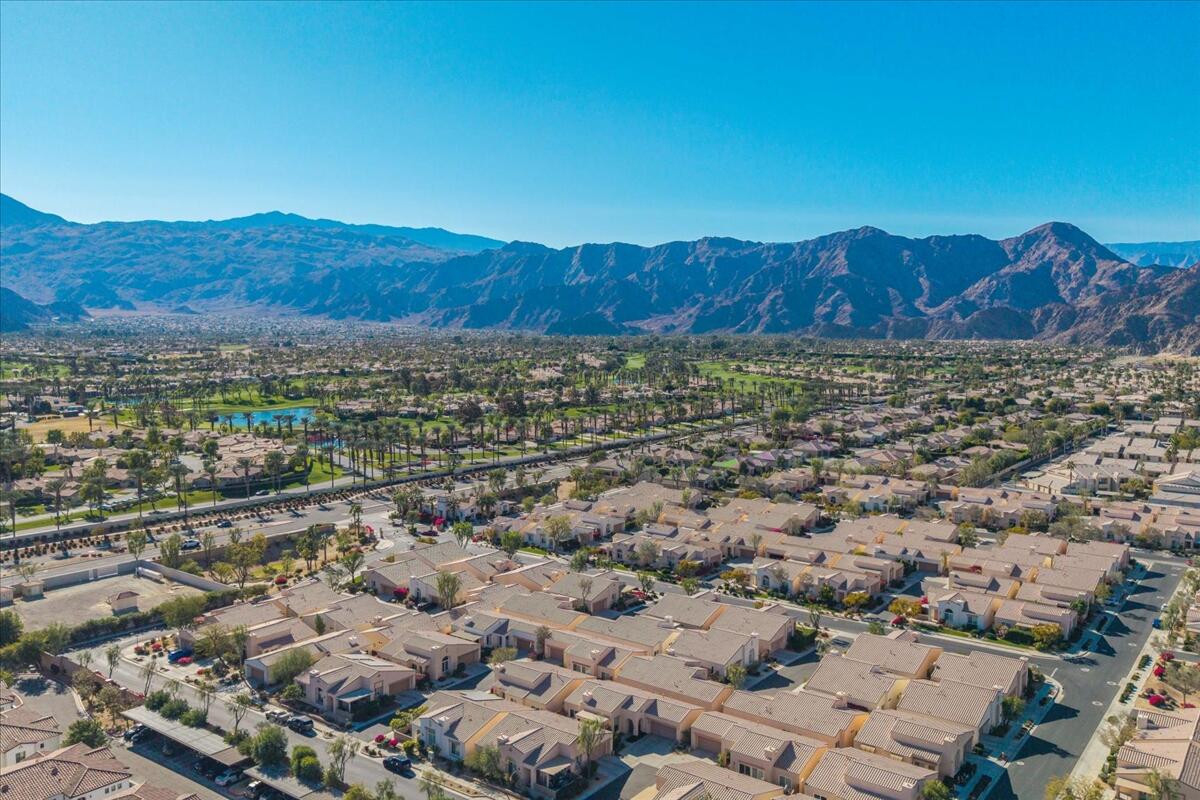 47795 Soft Moonlight La Quinta, CA 92253 - Photo 42 of 44 an aerial view of residential house and sandy dunes