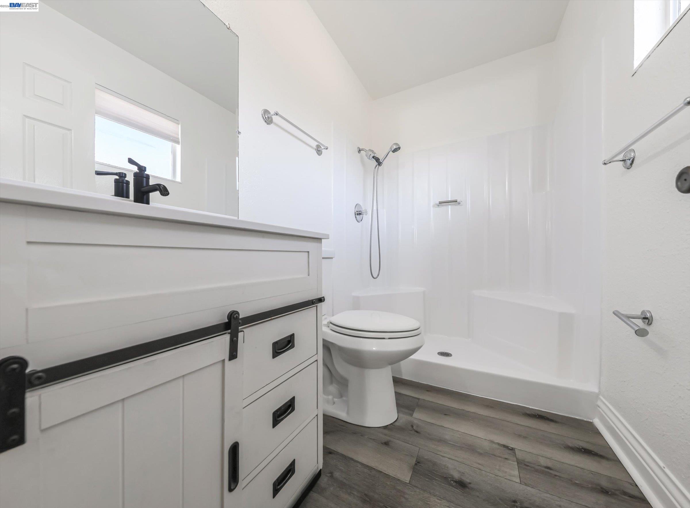 3432 Danielle Place Bay Point, CA 94565 - Photo 25 of 36 a bathroom with a toilet a sink and shower