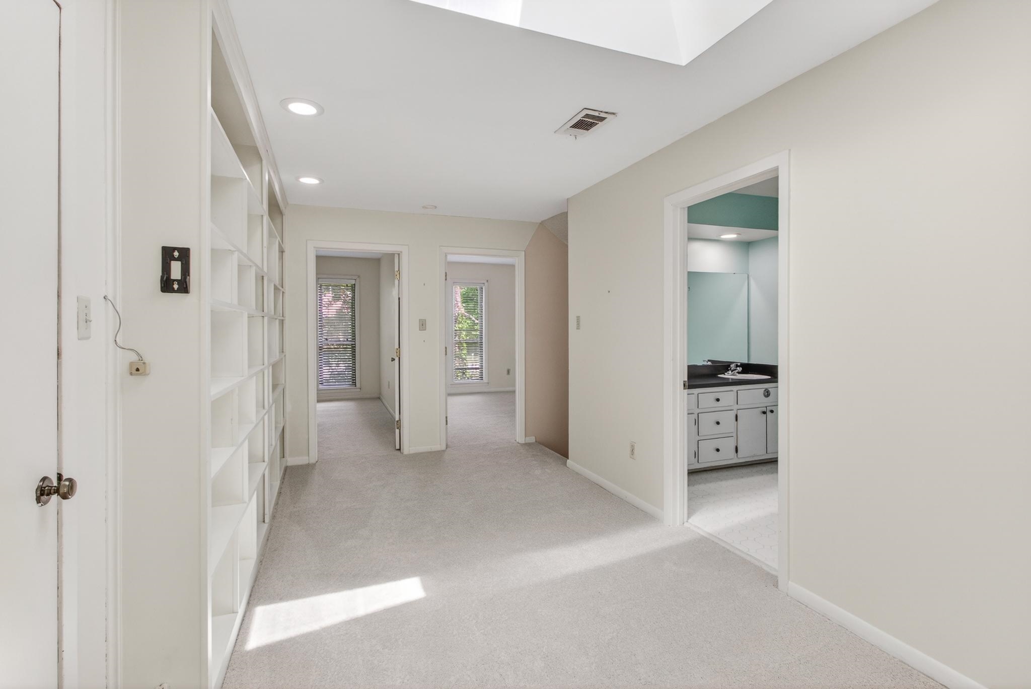 3121 Beechrun Drive Memphis, TN 38128 - Photo 29 of 40 An opposing view of the fantastic loft space, looking towards the 3rd and 4th bedrooms and the full bath up.
