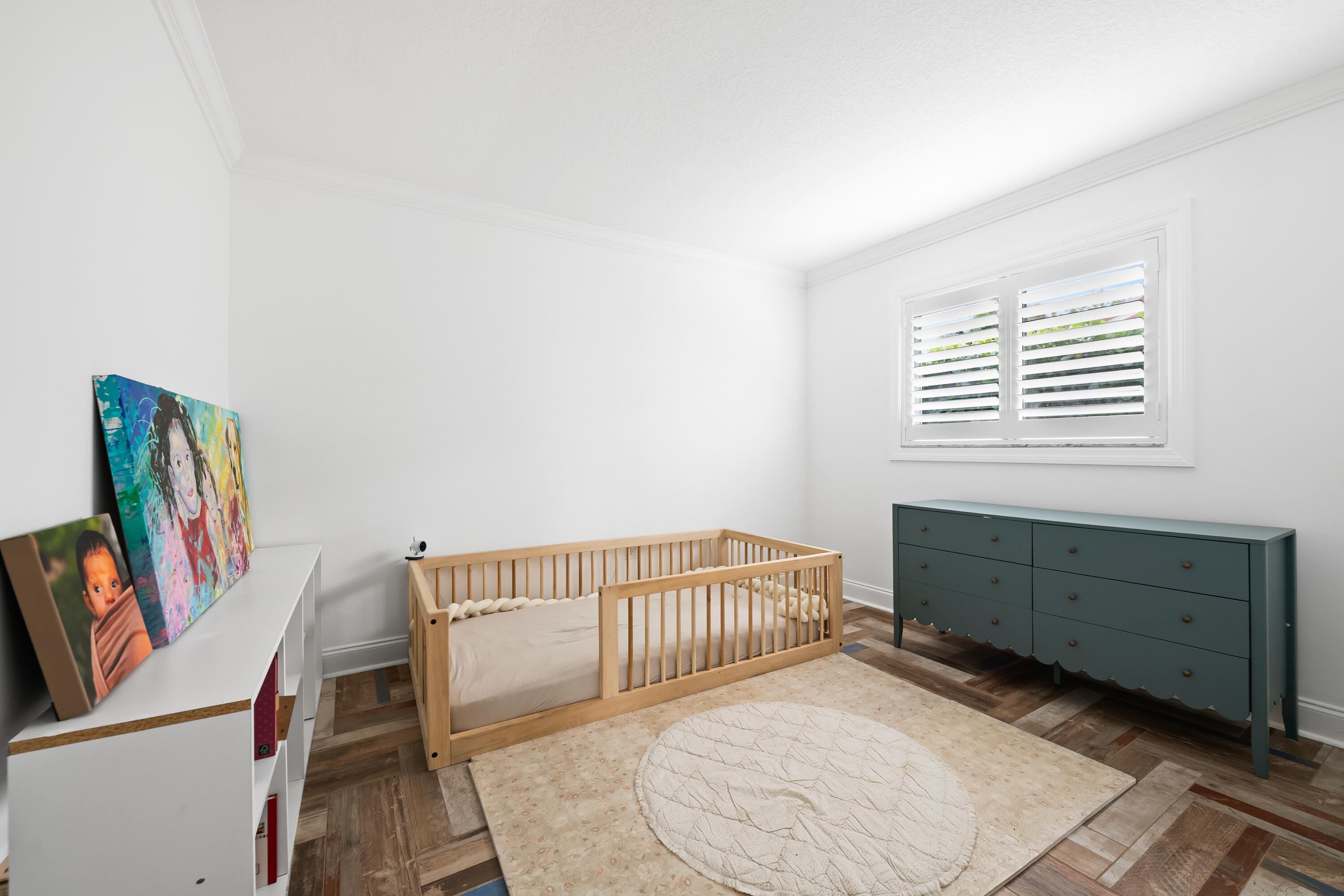 3333 Northwest 26th Court Boca Raton, FL 33434 - Photo 19 of 41 a bedroom with a bed and a window