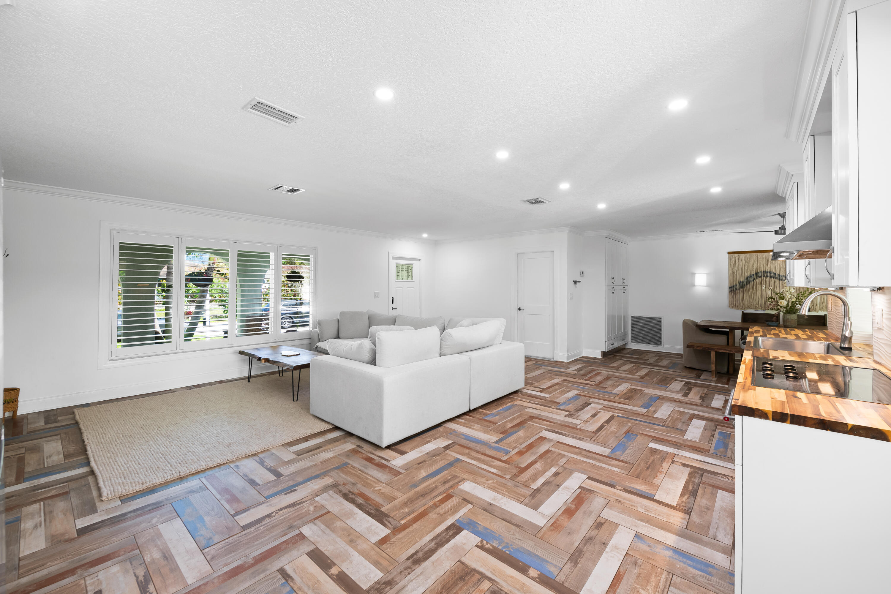 3333 Northwest 26th Court Boca Raton, FL 33434 - Photo 7 of 41 a living room with furniture and a table