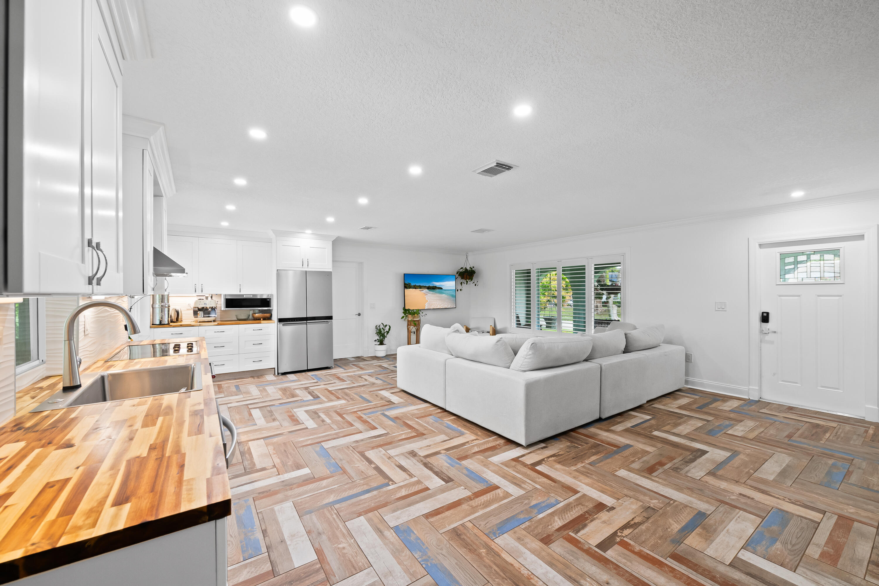 3333 Northwest 26th Court Boca Raton, FL 33434 - Photo 8 of 41 a living room with furniture and a couch