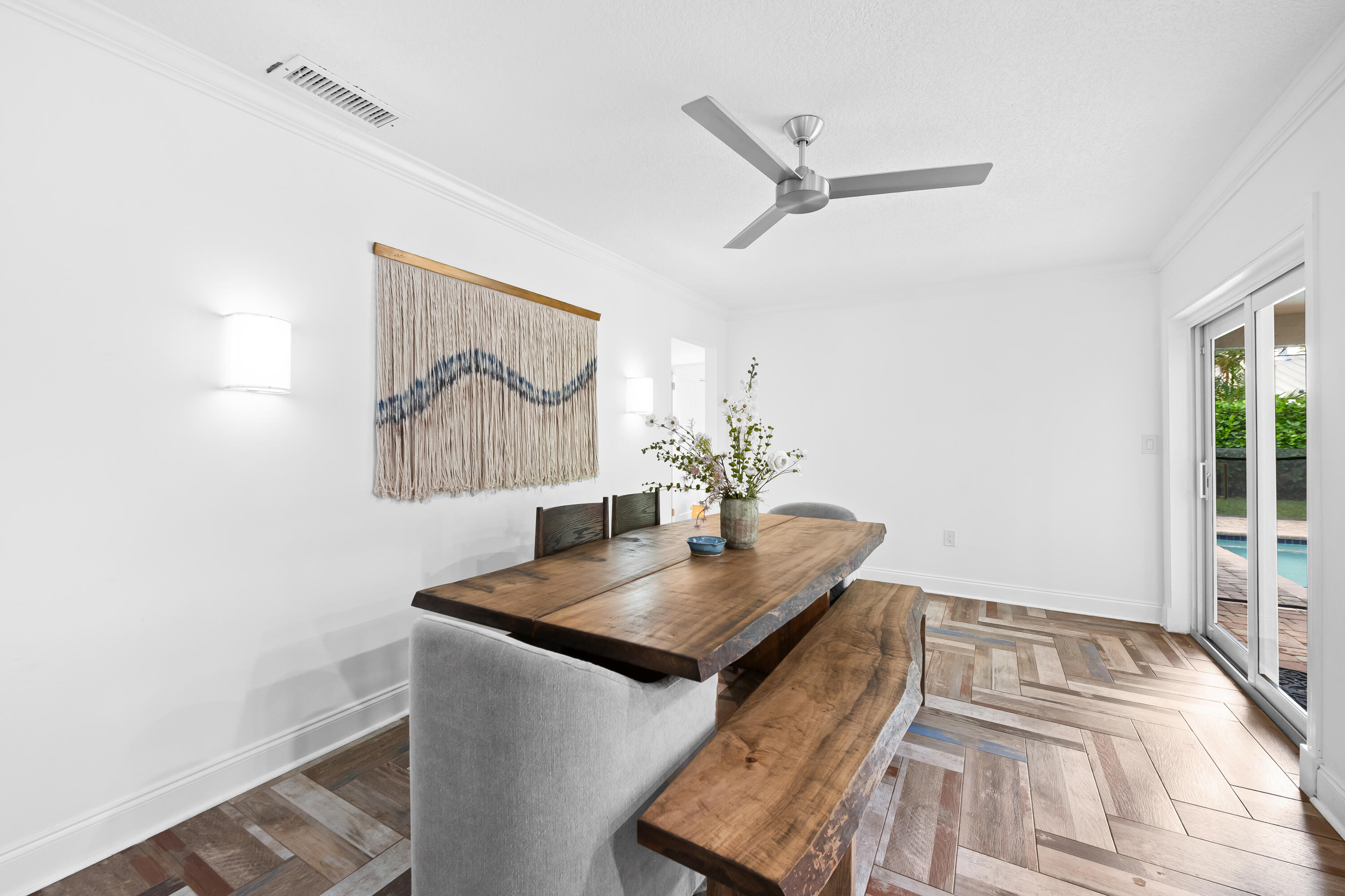 3333 Northwest 26th Court Boca Raton, FL 33434 - Photo 10 of 41 a living room with table and a potted plant