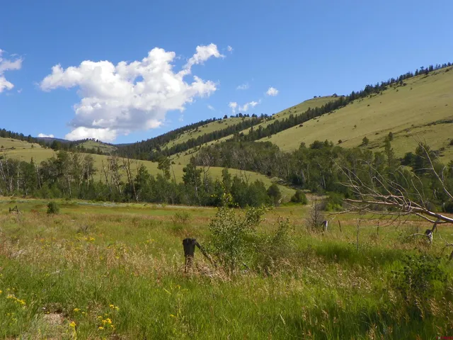 a view of mountain with lake view