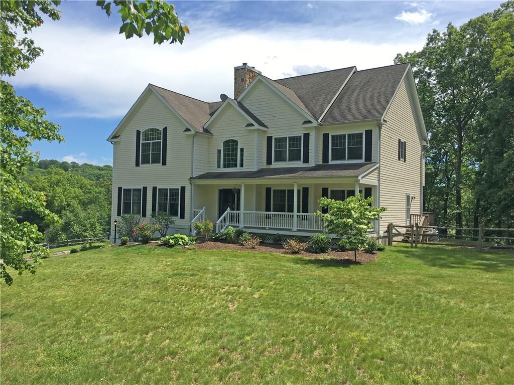 7 Daniels Hill Road Newtown, CT 06470 - Photo 1 of 1 a view of a house with a yard