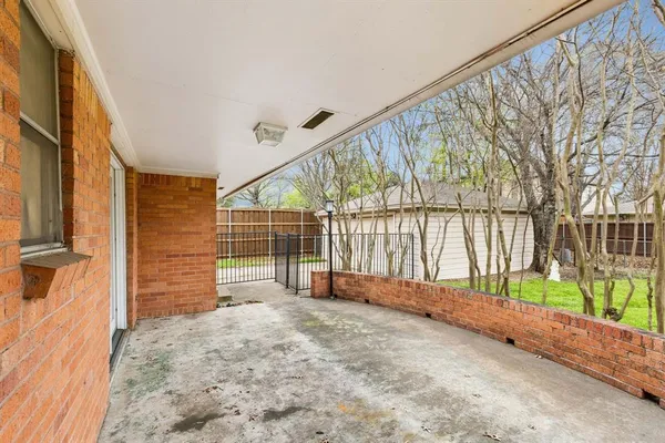 a view of outdoor space with wooden fence