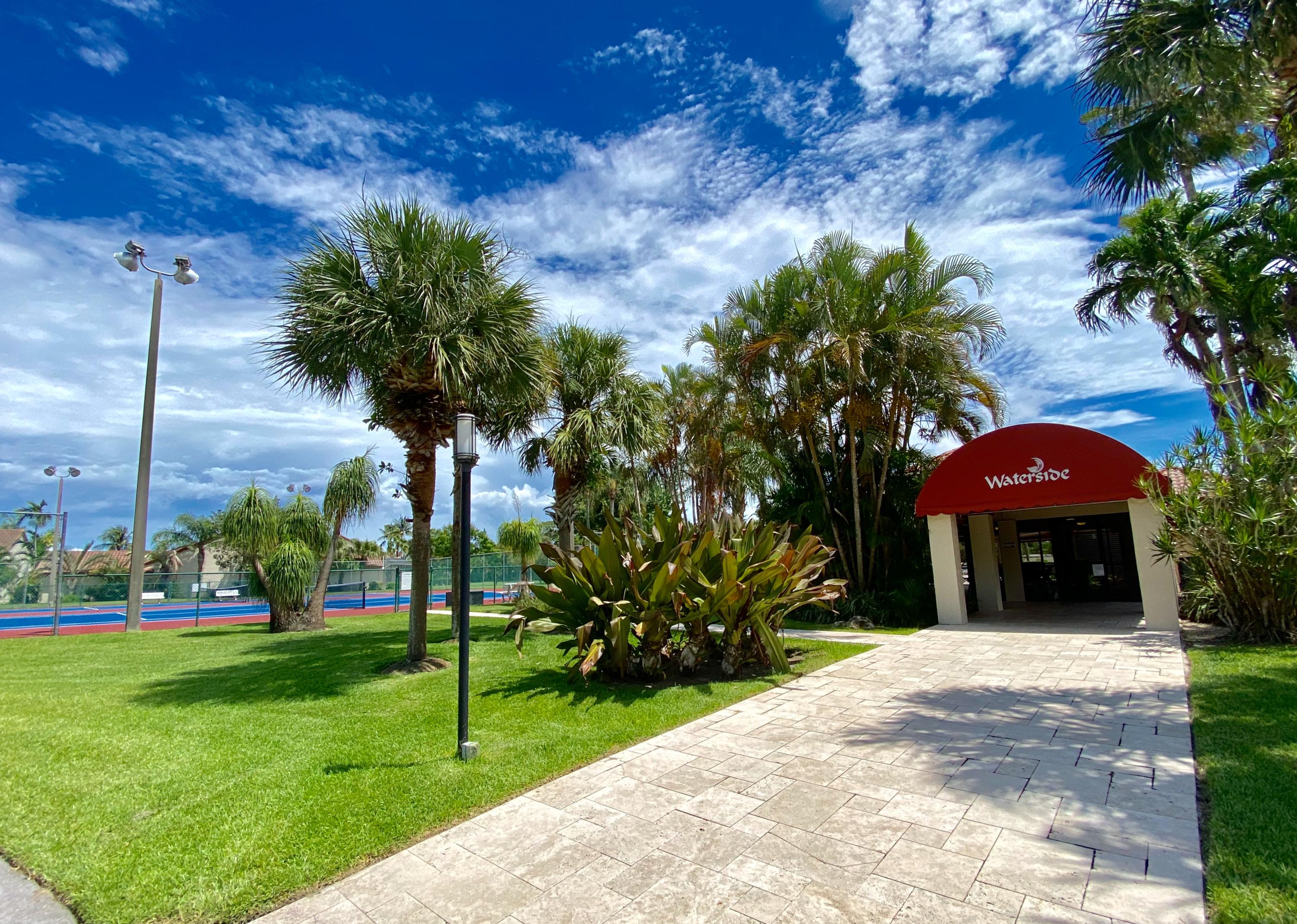 23489 Water Circle Boca Raton, FL 33486 - Photo 33 of 40 clubhouse & tennis