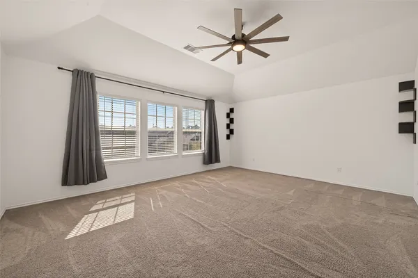 a view of a big room with carpet
