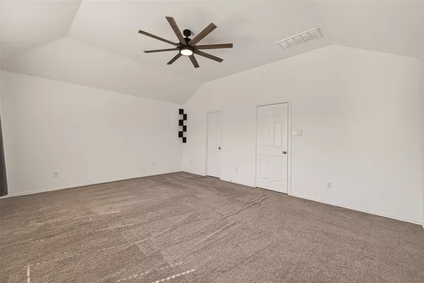 a view of a big room with carpet