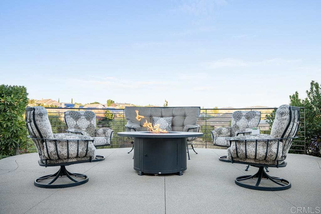15433 Artesian Ridge San Diego, CA 92127 - Photo 12 of 20 a view of roof deck with furniture and city view