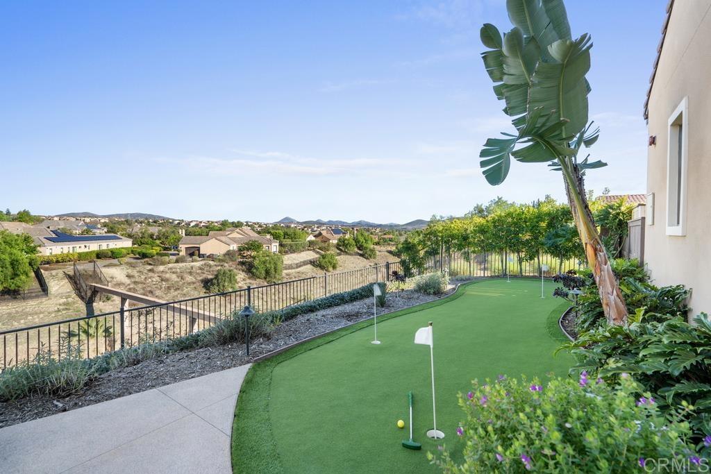 15433 Artesian Ridge San Diego, CA 92127 - Photo 13 of 20 a view of a lake with a garden