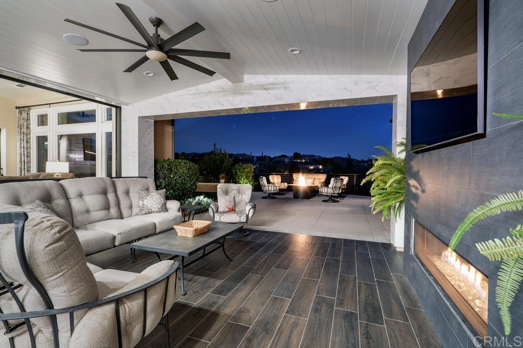 15433 Artesian Ridge San Diego, CA 92127 - Photo 19 of 20 a living room with furniture and a fireplace
