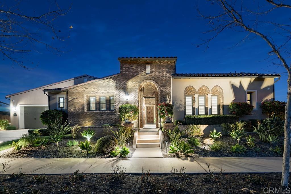 15433 Artesian Ridge San Diego, CA 92127 - Photo 20 of 20 a front view of a house with garden