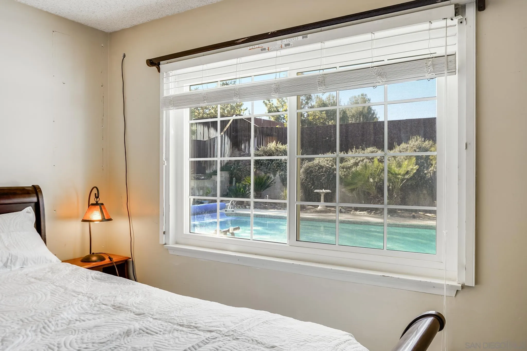1520 Ransom Place Riverside, CA 92506 - Photo 20 of 33 a view of a bedroom with a large window