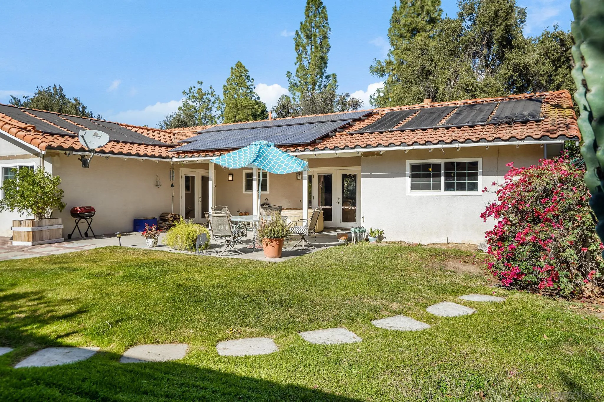 1520 Ransom Place Riverside, CA 92506 - Photo 30 of 33 a view of a house with backyard porch and sitting area