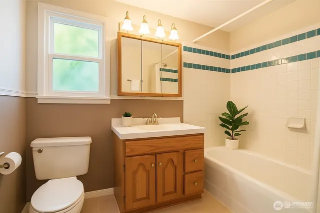 a bathroom with a sink a toilet and a bathtub