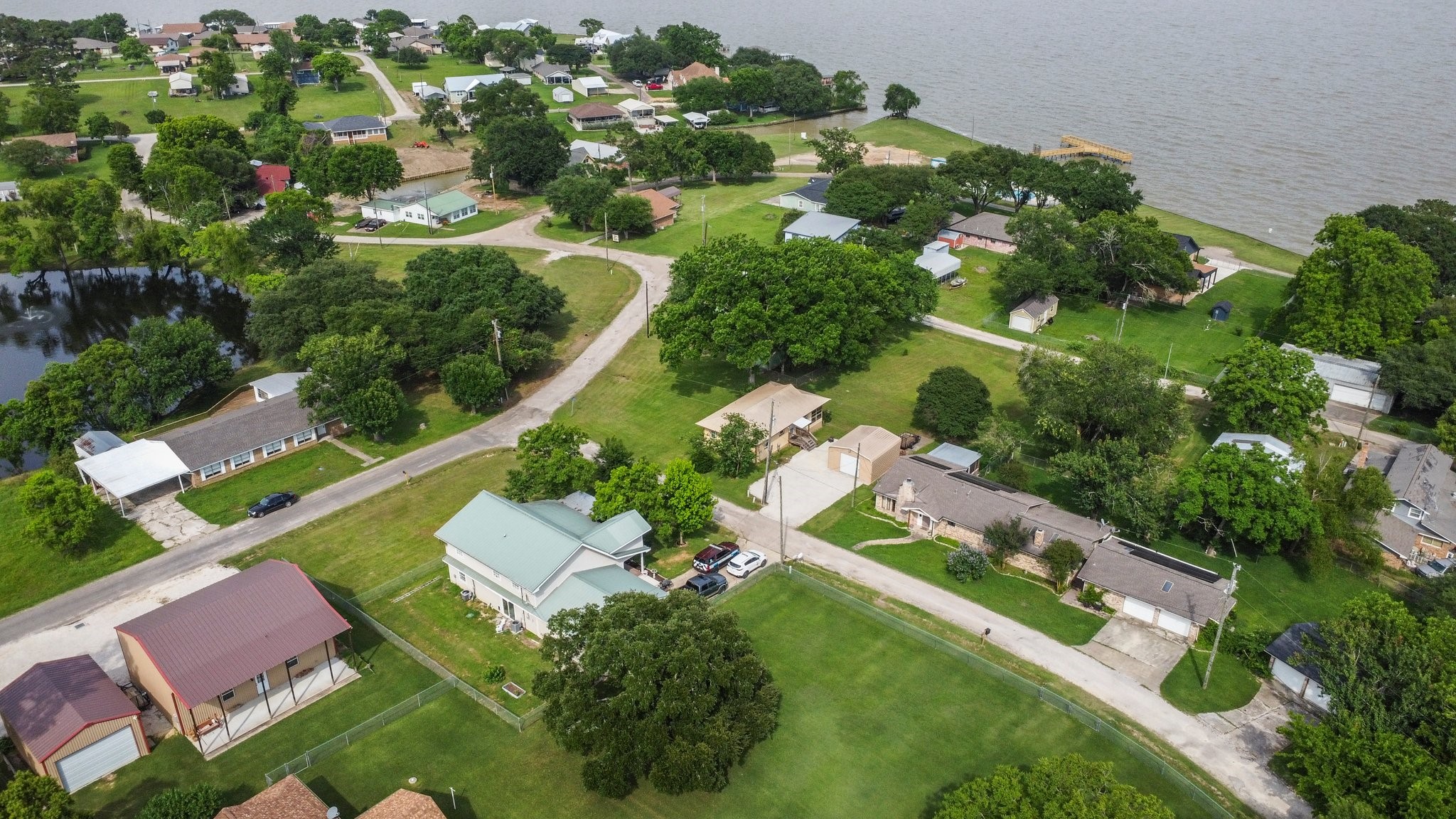 21 Clearview Point Blank, TX 77364 - Photo 32 of 43 an aerial view of a house with a yard
