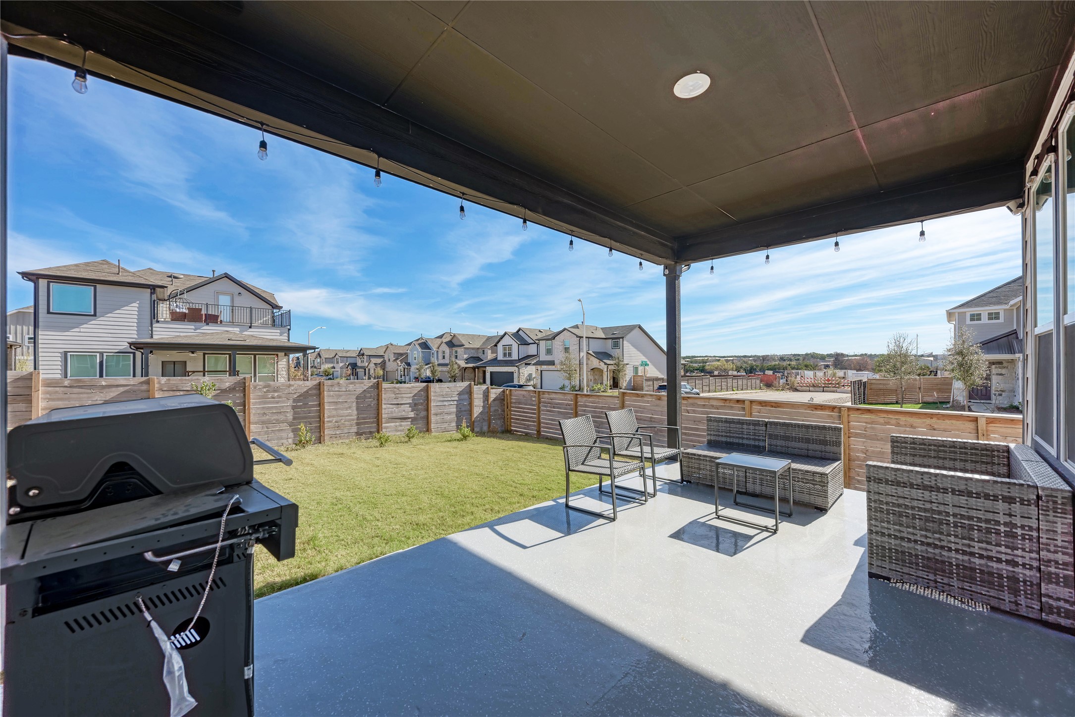 316 Regatta Trail Leander, TX 78641 - Photo 36 of 39 Covered patio with integrated lighting and concrete flooring
