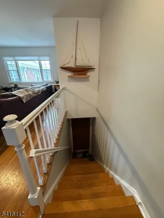 a view of a livingroom with wooden floor