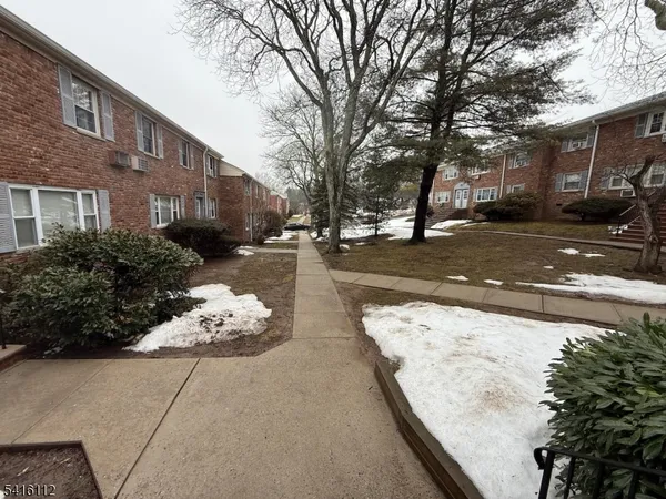 a view of a street with cars