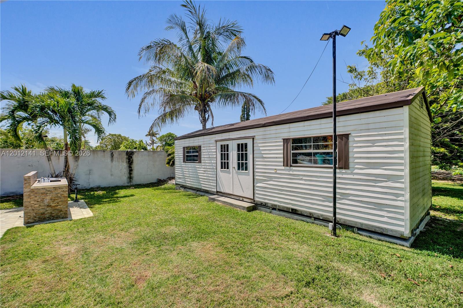 12401 Southwest 45th Street Miami, FL 33175 - Photo 67 of 79 Storage Shed