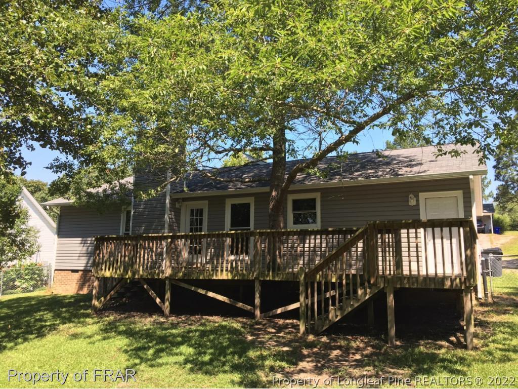 3320 Red Fox Road Spring Lake, NC 28390 - Photo 17 of 19 a view of house with a yard