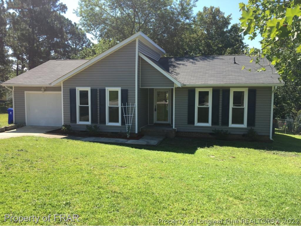 3320 Red Fox Road Spring Lake, NC 28390 - Photo 19 of 19 a view of a house with a yard