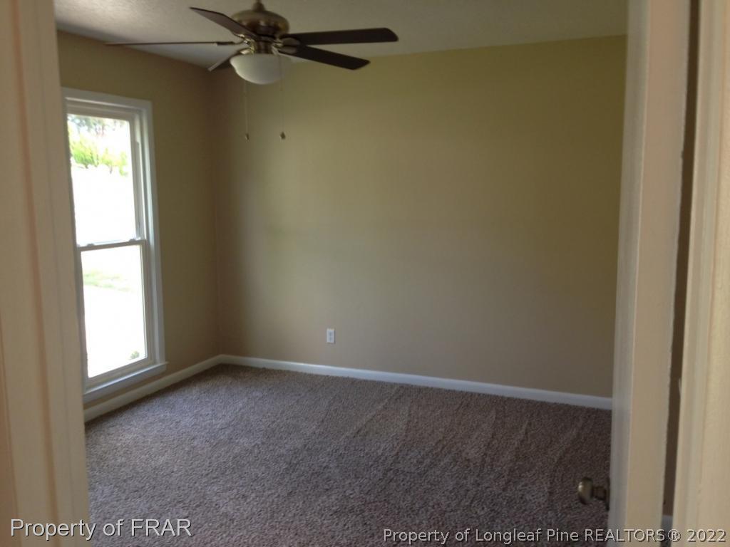3320 Red Fox Road Spring Lake, NC 28390 - Photo 8 of 19 an empty room with a window