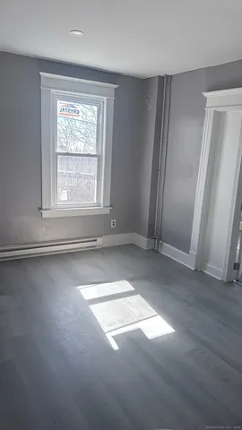 an empty room with windows