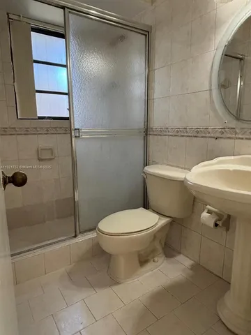 a view of empty room with windows