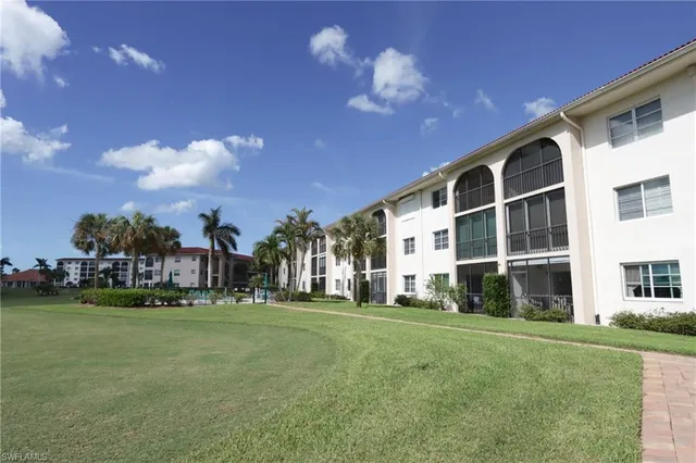 a view of building with yard