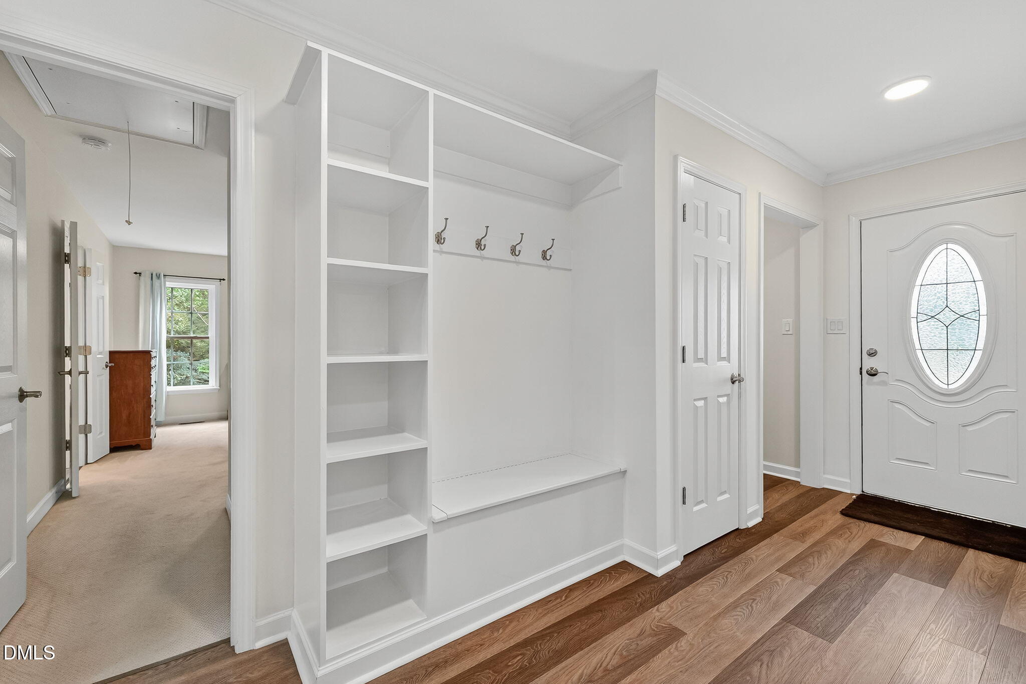 6009 Swales Way Raleigh, NC 27603 - Photo 26 of 59 a view of a room with wooden floor