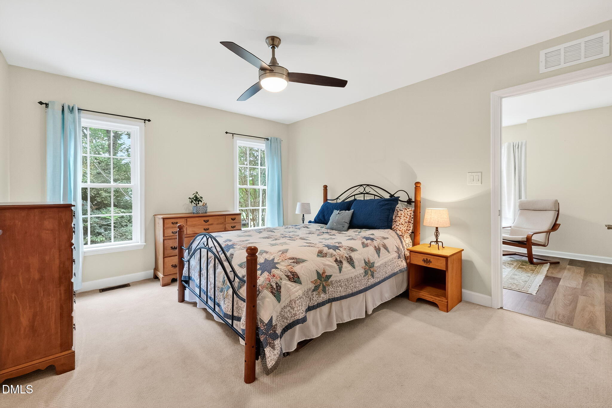 6009 Swales Way Raleigh, NC 27603 - Photo 29 of 59 a bedroom with a bed couch and window