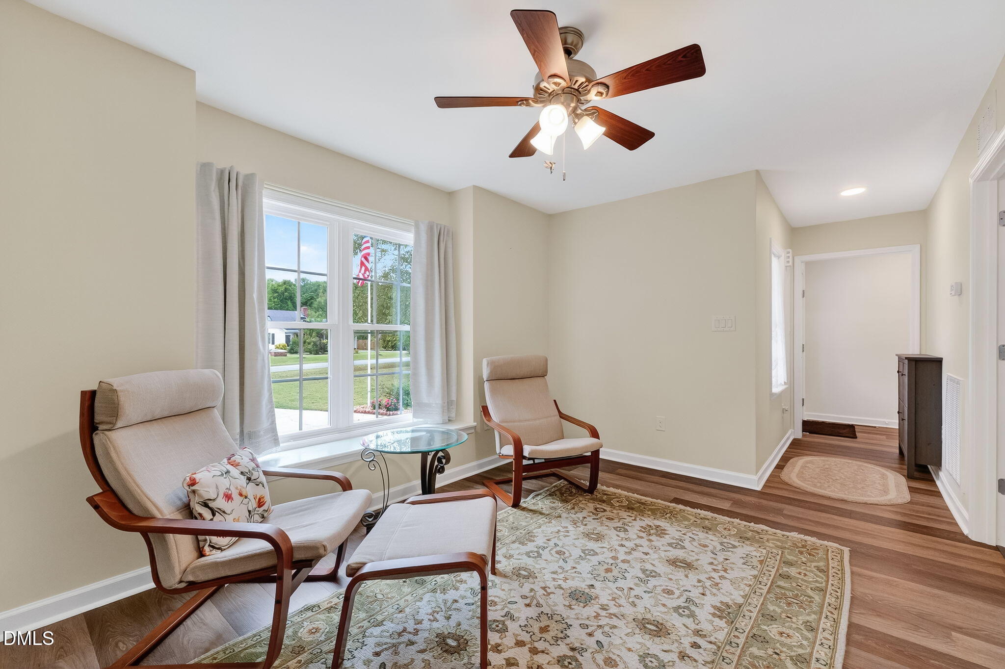 6009 Swales Way Raleigh, NC 27603 - Photo 36 of 59 a living room with furniture and a window
